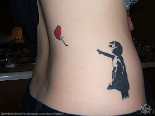 Believe in Yourself graffiti ribcage tattoo