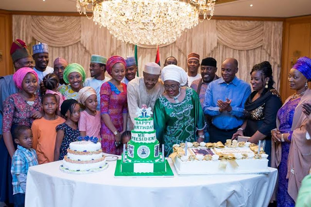 PMB flanked by family