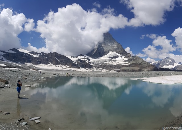 Matterhorn reflected on the surface of the a lake along the Matterhorn Glacier Trail