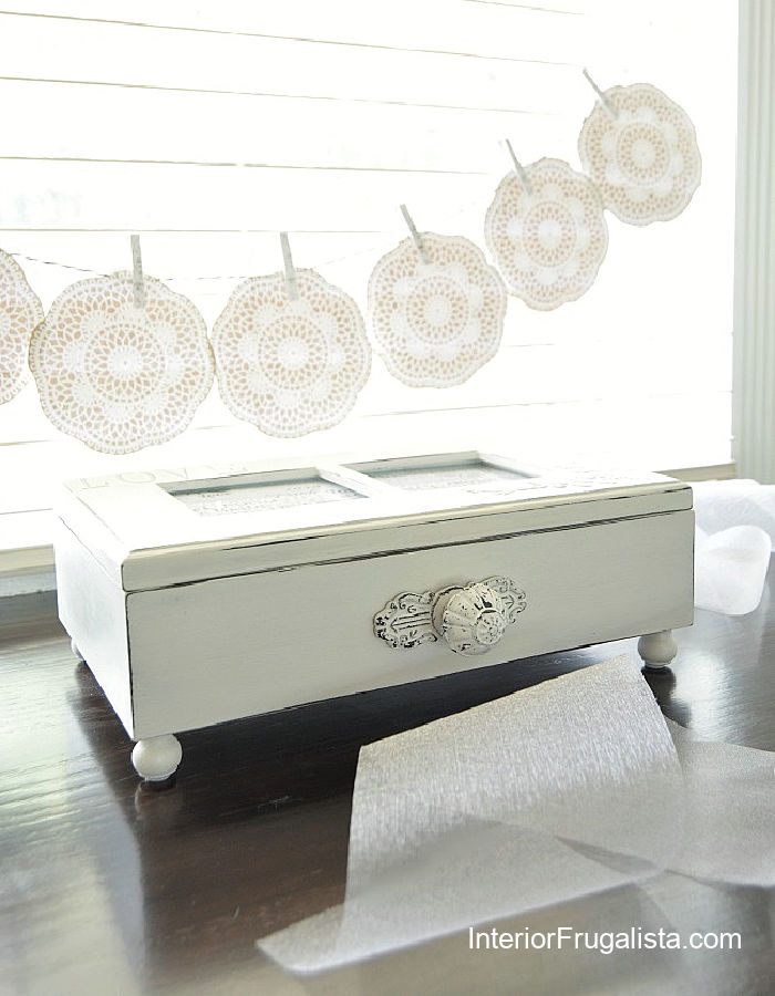 An elegant upcycled wedding gift keepsake box with a pretty white knob from voyage to Hobby Lobby.