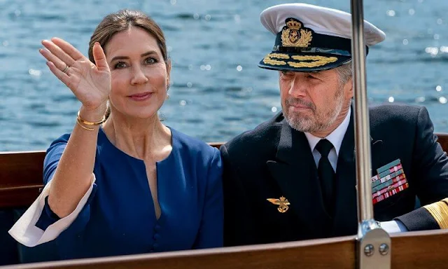 Queen Margrethe, Crown Prince Frederik, Crown Princess Mary and Princess Benedikte. Crown Princess Mary wore a navy dress