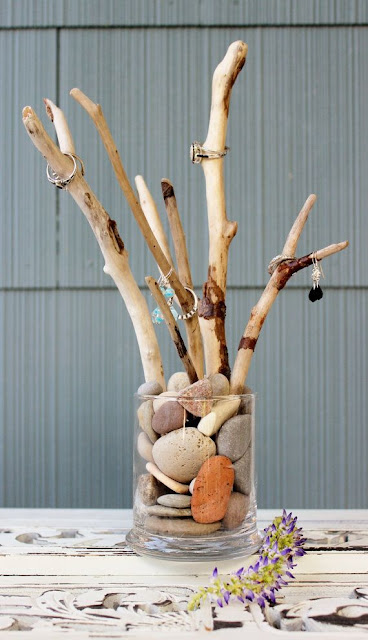 A tree branch-style jewelry display.