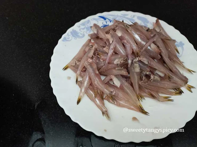 Cleaning Anchovies for Marination - Preparing for Flavorful Kozhuva Varuthathu