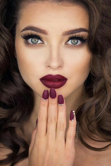 Red lipstick and red nail art