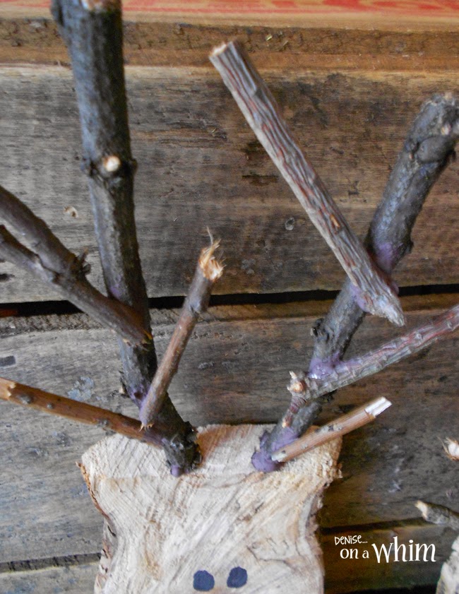 Adorable Reindeer Made from Log Slices and Twigs via Denise on a Whim