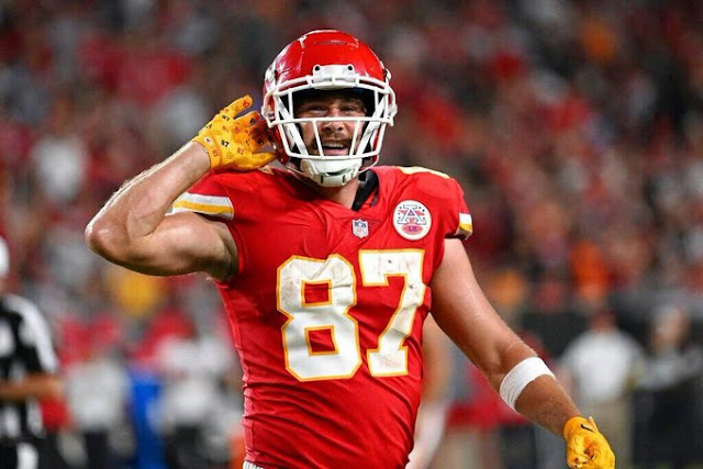 Swift returns to watch the Kansas City Chiefs defeat the Denver Broncos, and Travis Kelce shines.