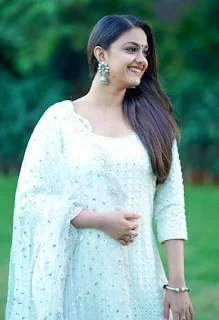 Keerthy Suresh in White Dress with Cute Smile in Sarkar Promotions 1