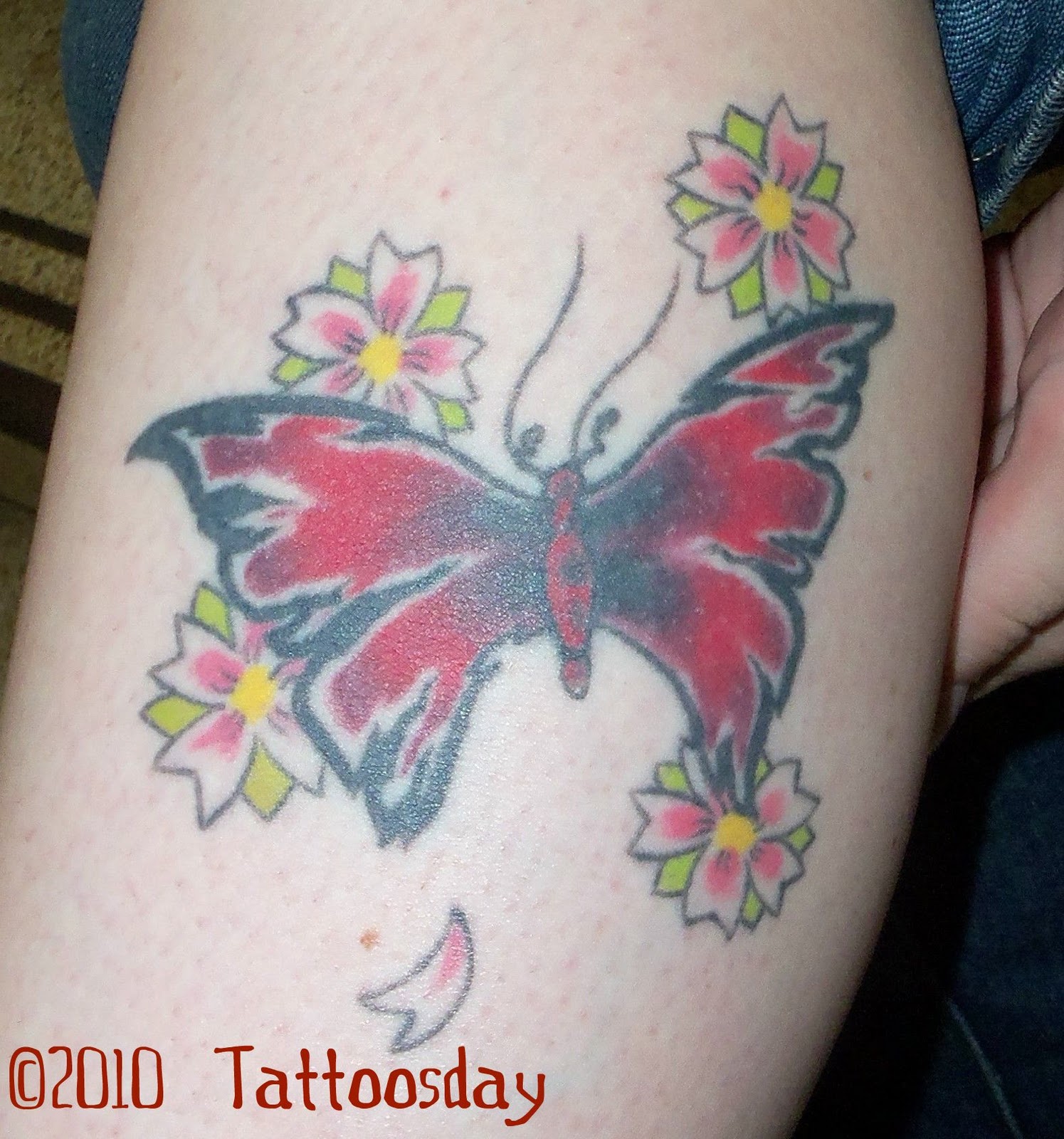 butterfly and hawaiian flower tattoos
