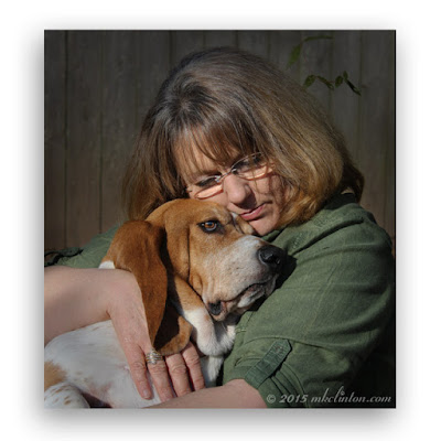 Hugging Bentley the Basset Hound