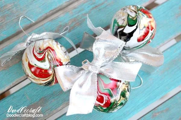 Marbled Ornaments   Dip plastic ornaments in EasyMarble and make stunning ornaments that look super chic!   These make great gifts or a fun upgrade to your holiday decor!