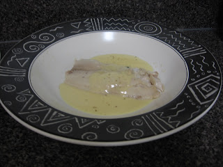 Basil steamed tilapia with lemon creme sauce