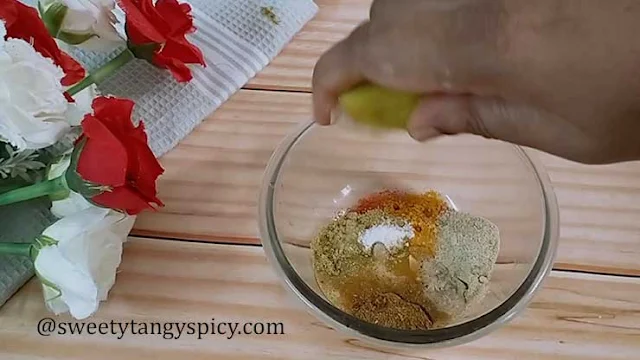 "Preparing Marinade with Spices, Rice Flour, and Corn Flour"