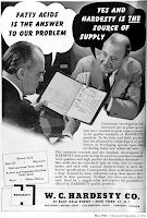 1944 W. C. Hardesty Co. advertisement, Chemical Industries. Two businessmen confer in photograph.