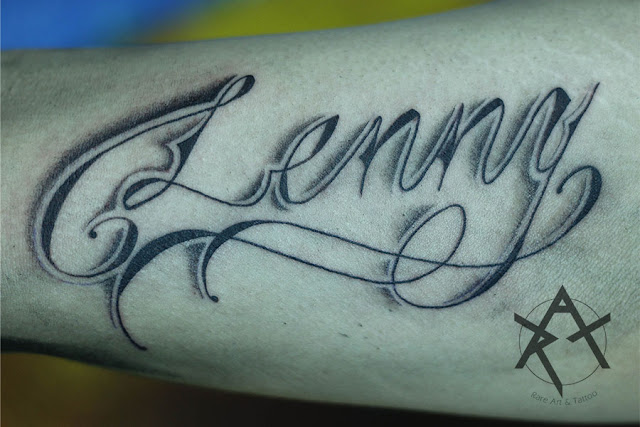Nombre Lettering tattoo