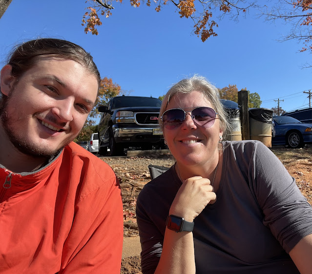 A pic of me and Andy at another one of Elizabeth's soccer games. The sky is blue, but the weather must have been a bit chilly as both Andy and I are dressed in warm clothes.