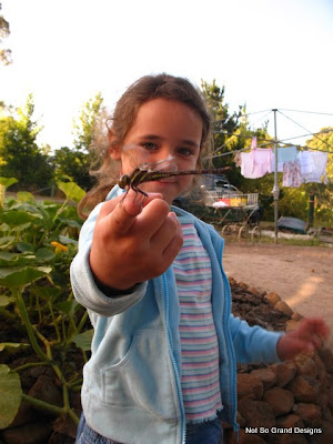 Glick holding a dragonfly