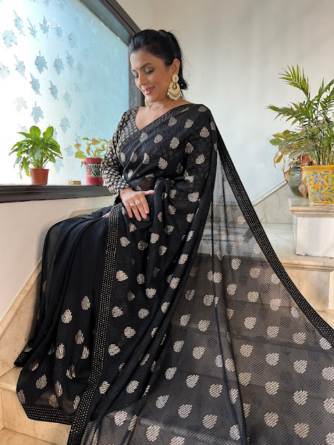 Embroidered black saree