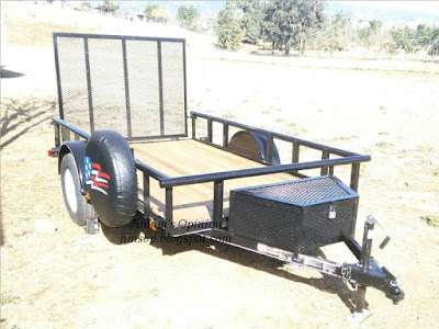 The new trailer with upgraded toolbox after the metal walls were added.