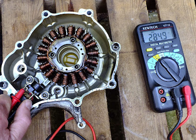 Yamaha YZF R125 testing the generator , alternator , stator rotor .