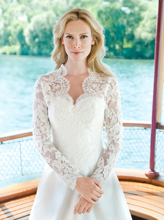 The lace top and sleeves add great royal tastes to this wedding gown