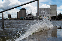 The rain-swollen Mississippi River was already flooding walkways and steps near a New Orleans levee when Barry became the second named storm of the 2019 Atlantic hurricane season on July 11. (Credit: Matthew Hatcher/SOPA Images/LightRocket via Getty Images) Click to Enlarge.