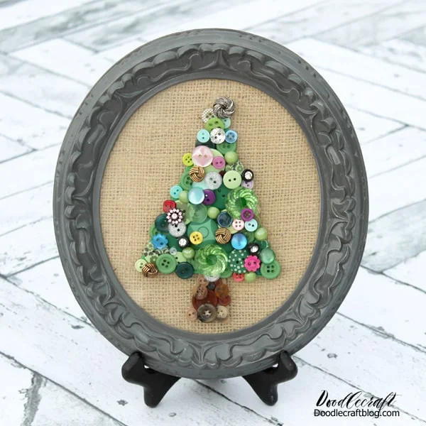 Jeweled Button Christmas Tree  Make a stunning decoration piece with some old buttons. I inherited a few button boxes in my days, so this one was easy for me. Packs of buttons can also be found at the dollar store. Find a simple frame, add some burlap and boom--perfection!