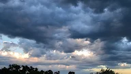 Storm Clouds Over Mountains, Large Storm Clouds Over Mountain Stock Footage Video (100% ... : Altocumulus standing lenticular, stratocumulus standing lenticular, and cirrocumulus standing lenticular, varying in altitude above the ground.