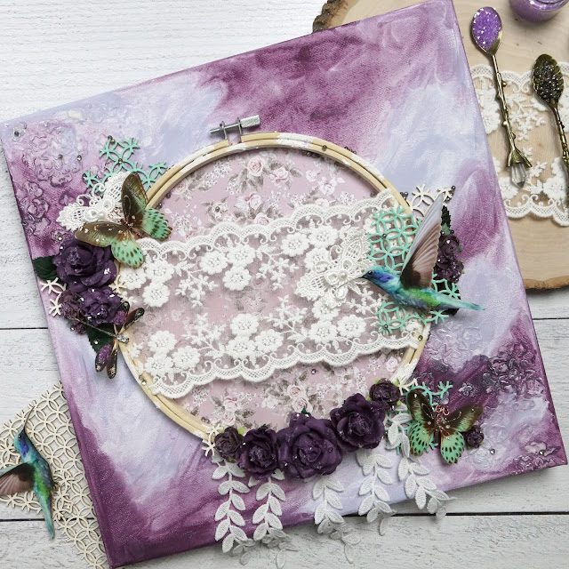 Mixed media project using Reneabouquets butterflies, chipboard, beads, glass glitter and lace