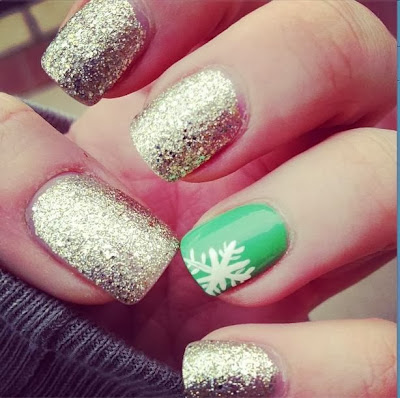 amazing gold and green Christmas nail art design . 