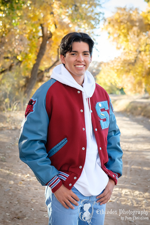 professional photo of a high school senior outdoor location bosque Albuquerque