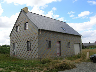 menuiseries aluminium bicolore sur la maison ossature bois