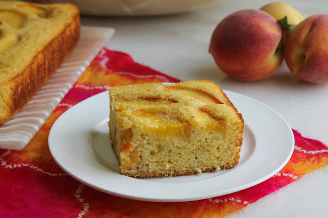 Food Lust People Love: The juicy fresh Georgia peaches inside and on top of this sweet peach cornbread make it super moist and absolutely delicious. You should use fresh sweet peaches when they are in season but you can certainly substitute canned peaches out of season.