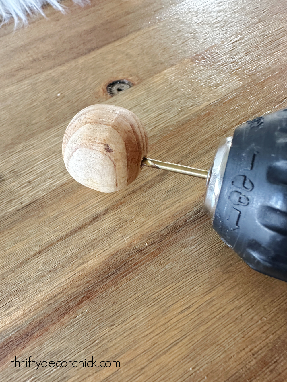 drilling hole into wood bead
