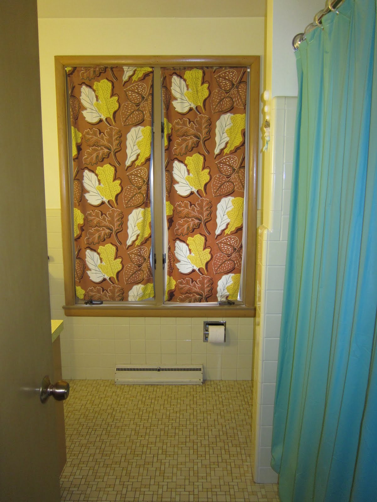 green color bathroom The floor is original with various size tiles and the tiles have 