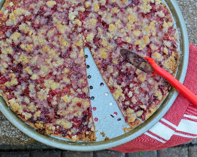 Sweet Rhubarb Pizza ♥ AVeggieVenture.com. A thin cookie crust topped with summer rhubarb brightened, reddened with jello powder.