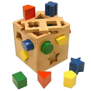 wooden shape sorting cube