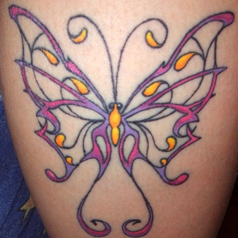 Colored butterfly tattoos look great if tattooed simple or as a part of a