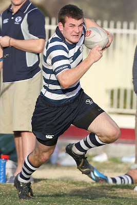 BYU Rugby Flanker Ryan Roundy finds space to advance up-field on a keeper