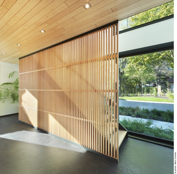 Modern stairs in Renovated Bord-du-Lac House by Henri Cleinge
