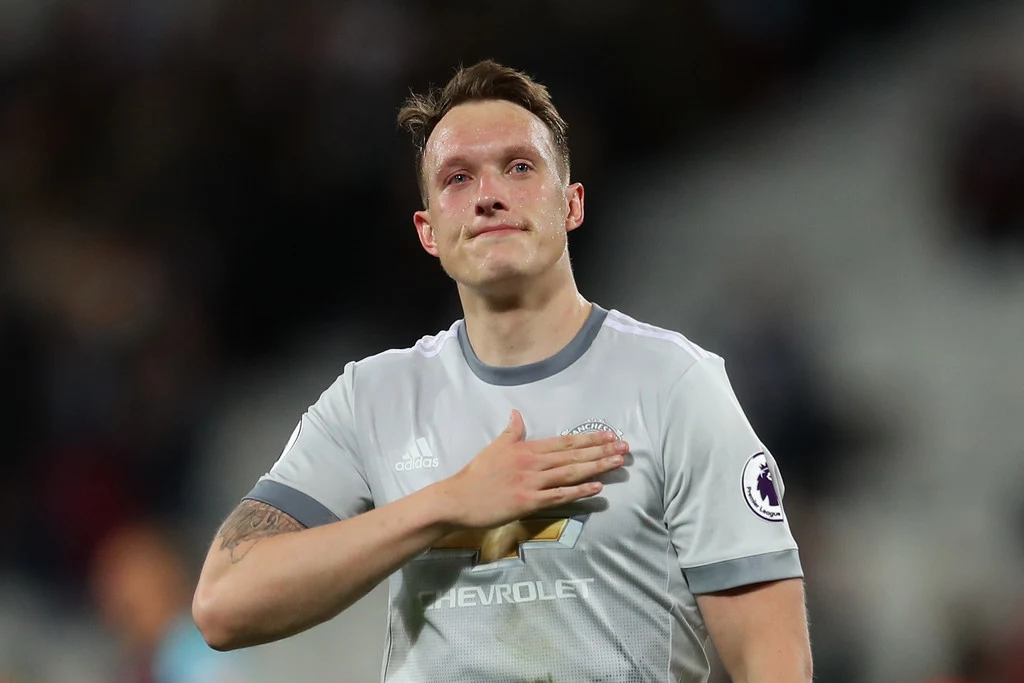 Phil Jones of Manchester United shows appreciation to the fans after the Premier League match between West Ham United and Manchester United at London Stadium on May 10, 2018 in London, England