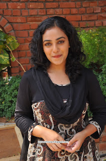 Nitya Menon cute black dress stills