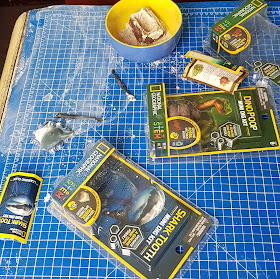 National Geographic Mini Dig Kits being used by children mess on table