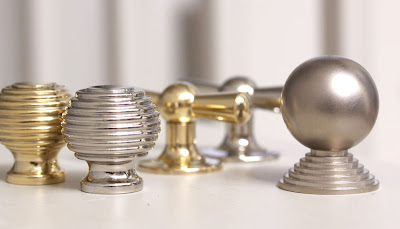 Cabinet fittings and door furniture