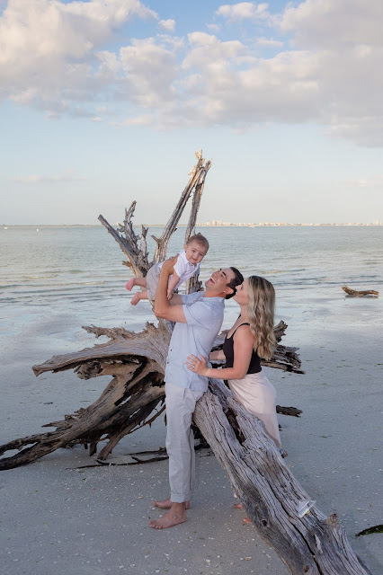 Family Photo with driftwood on Sanibel