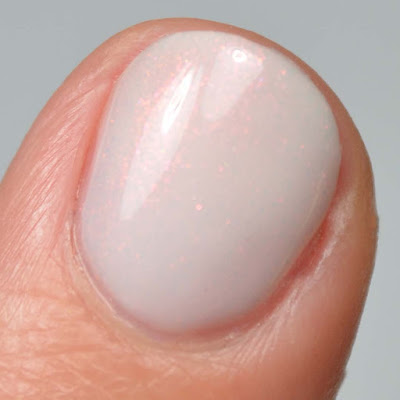 white nail polish with shimmer swatch