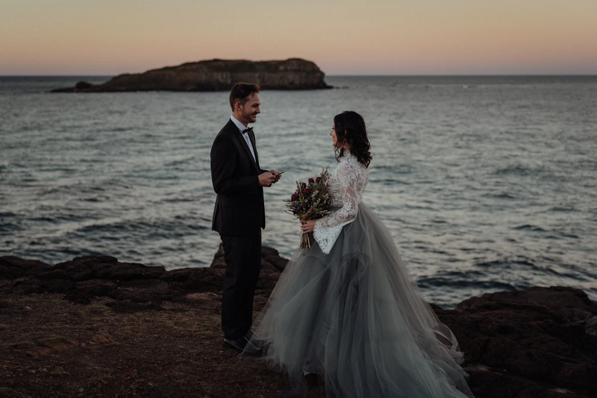 white parrot film and photography beach wedding elopement australian designer dark moody bridal fingal head