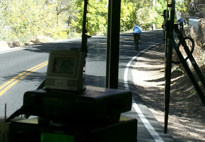 Electric bike, narrow road, seen from bus.