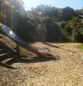 pregnant belly on the slide