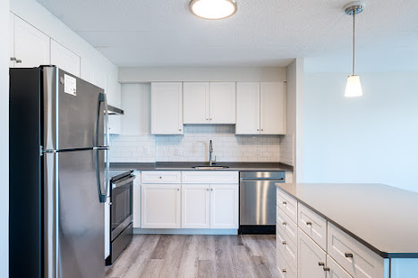 Renovated kitchen in apartment at Faxon Commons
