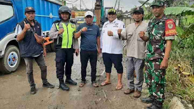 Babinsa Koramil 0621-23/Parung Panjang Laksanakan Gotong-royong di wilayah Binaan